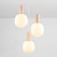 Suspension 3 lumières Vesso avec abat-jours en verre blanc laiteux et travertin