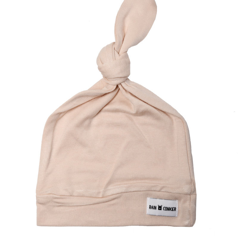 Rain+Conker Rain+Conker Top Knot Stretchy Hat - Blush