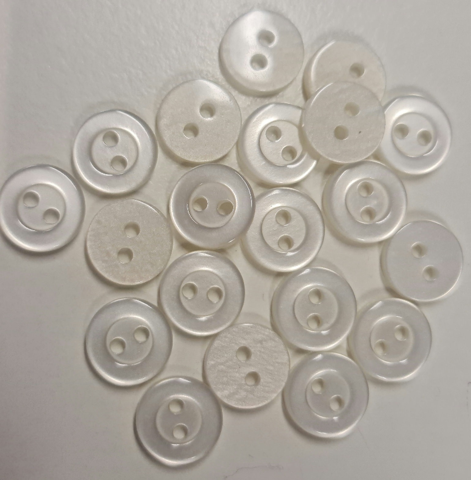 Knoop klein overhemd transparant 11mm