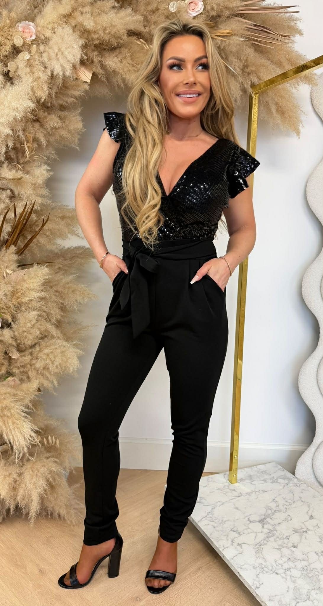 DISCO RUFFLE JUMPSUIT BLACK DISCO RUFFLE JUMPSUIT BLACK
