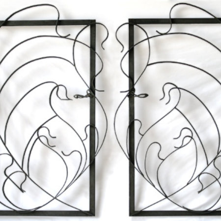 Jugendstil hekwerk gespiegeld