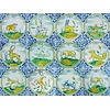 Tiles with animals in a meander circle in colour 13-24