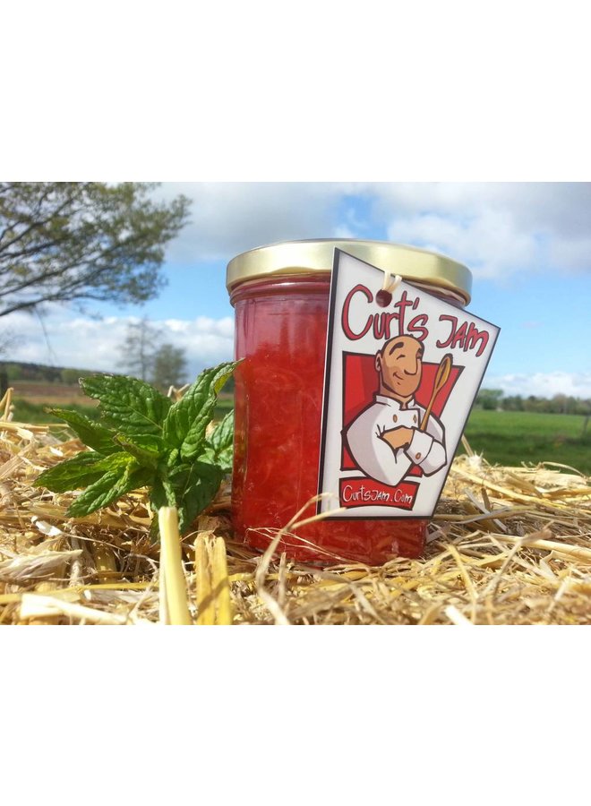 Fresh Belgian handmade strawberry jam with fresh mint leaves