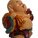 Goudkleurige kleine happy boeddha, met hoeloe vrucht