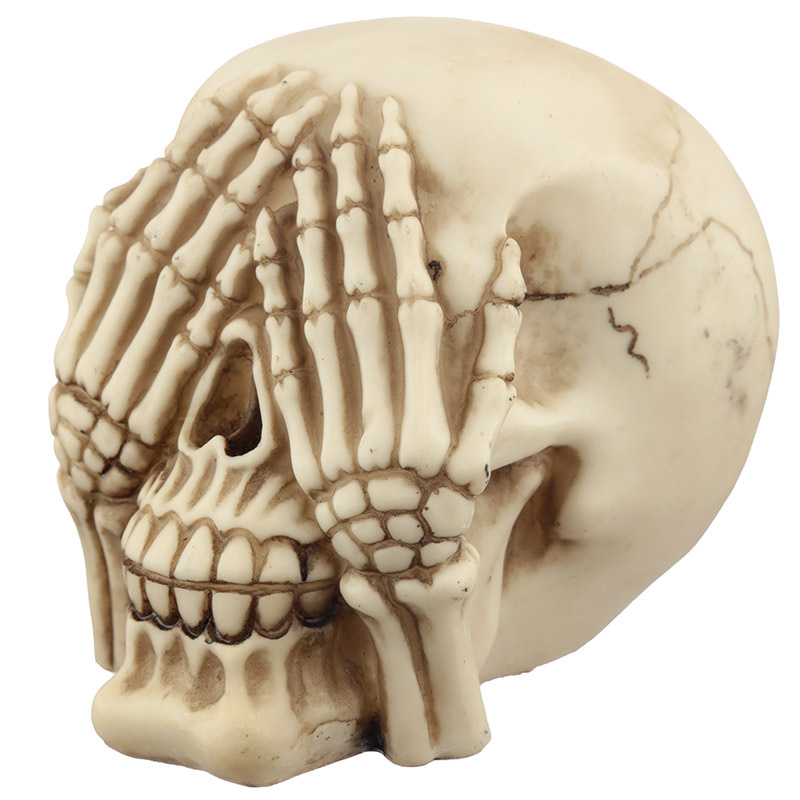Set van 3 schedels; horen zien zwijgen