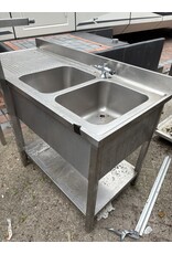 RVS Spoeltafel Dubbele Wasbak 160 x 70 x 99cm (B x D x H) Wordt schoongemaakt bij levering