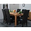 Eiken eettafel massief met 6 zwarte stoelen Giessen