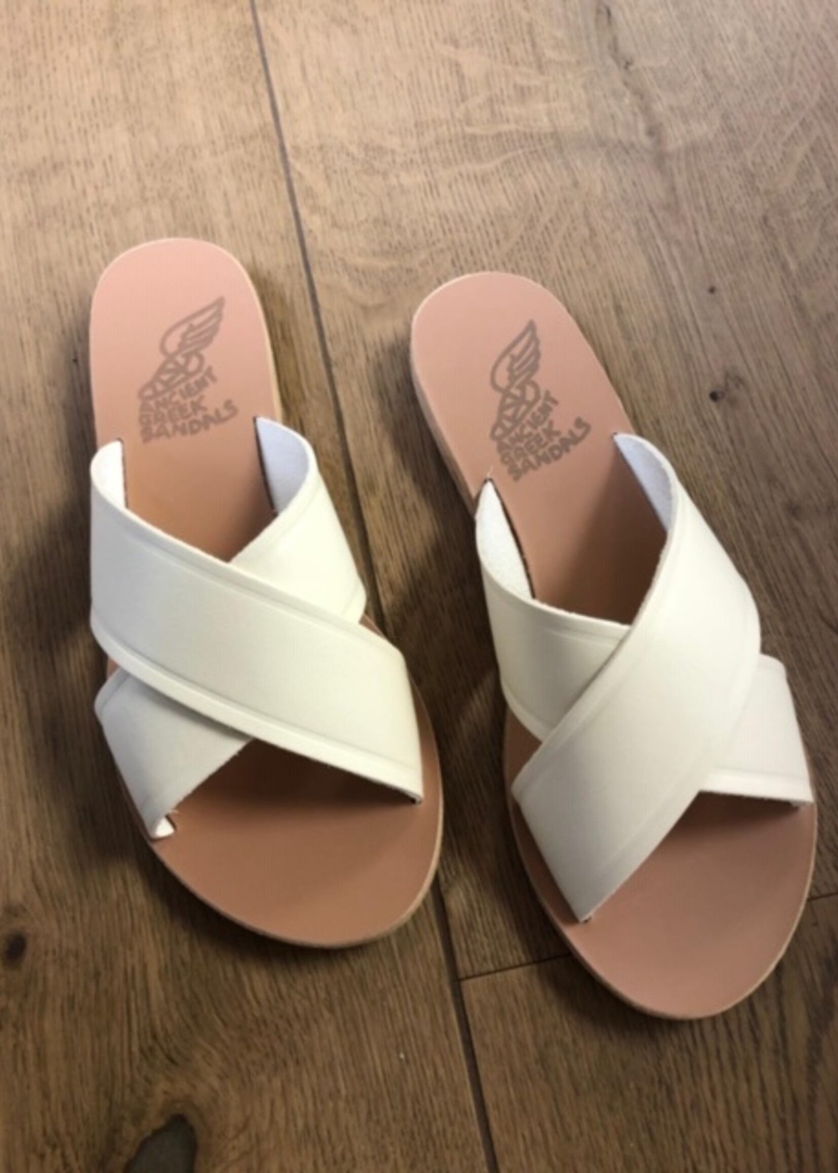 A classic white look 🤍🤍 the Desmos... - Ancient Greek Sandals | Facebook