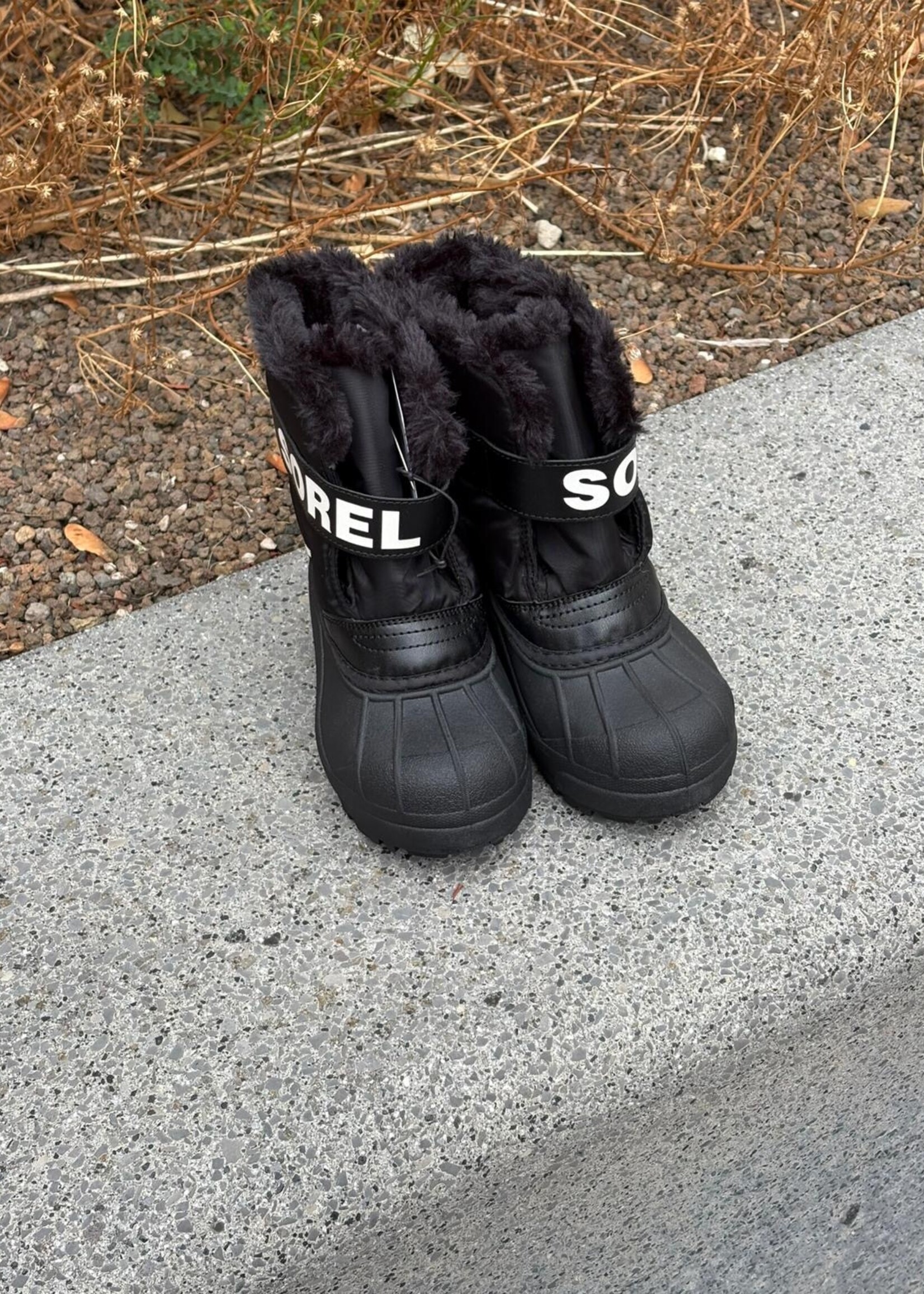 Sorel kids snow commander black sea salt