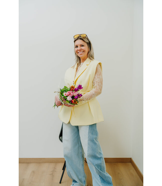 Sleeveless blazer soft yellow
