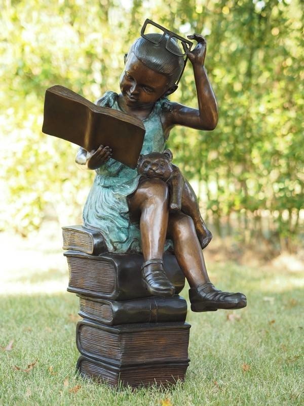 Bronze sculpture reading girl with glasses Eliassen Home & Garden