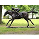 Bronzen jockey op een paard Bronzen jockey op een paard