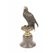 Image bronze Bird of prey on foot Image bronze Bird of prey on foot