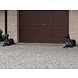 Bronzen liggende hond links Bronzen liggende hond links