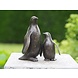 Bronzen pinguin en kind Bronzen pinguin en kind