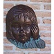 Bronzen meisjesgezicht Bronzen meisjesgezicht