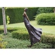 Bronze woman with hands behind her back Bronze woman with hands behind her back