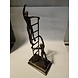 Bronze sculpture 2 people pointing on a ladder Bronze sculpture 2 people pointing on a ladder