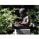 Bronzen beeld Lezende jongen Bronzen beeld Lezende jongen
