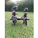 Bronzeskulptur Junge und Mädchen auf einer Couch Bronzeskulptur Junge und Mädchen auf einer Couch
