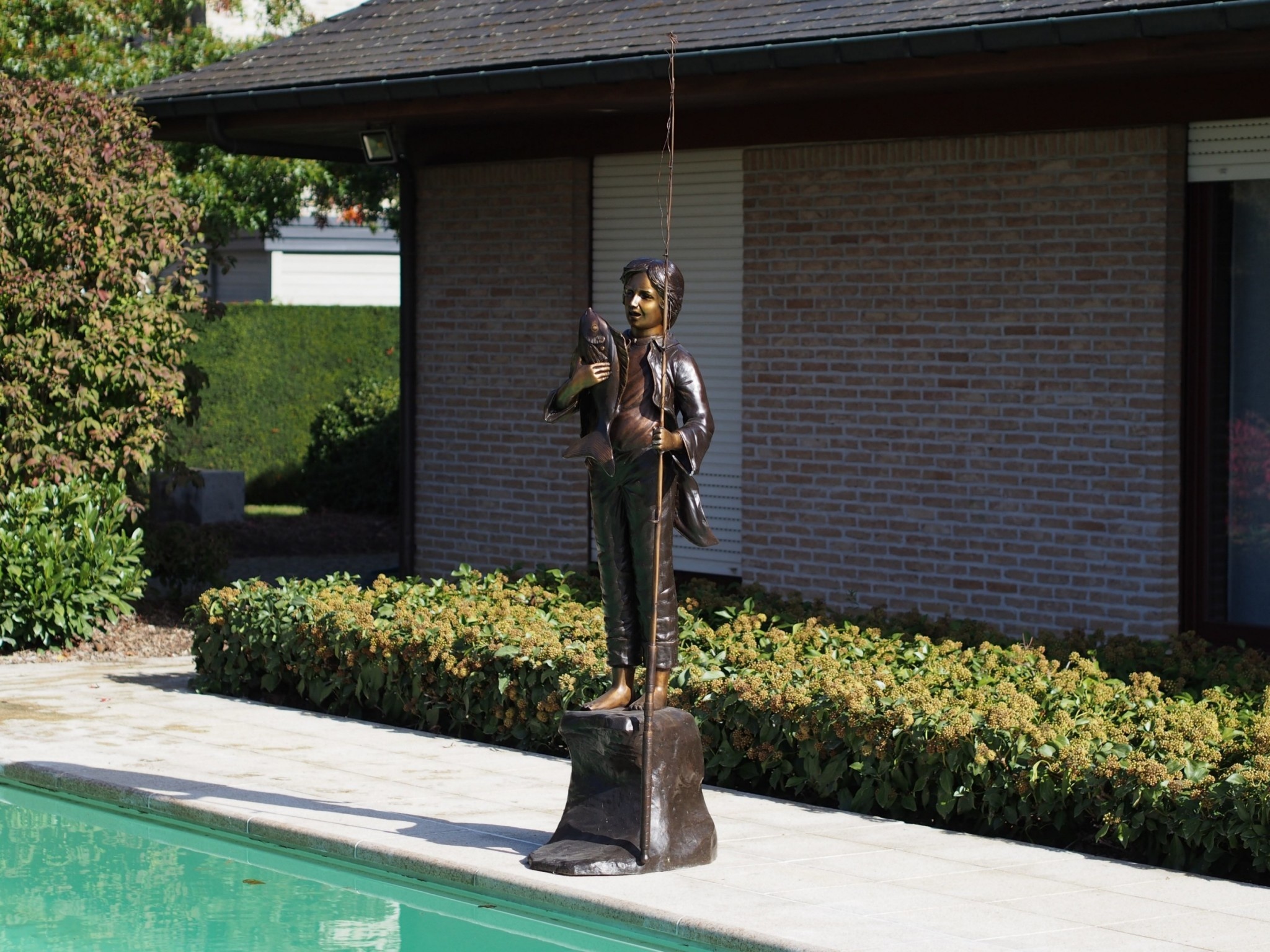 Bronze sculpture Boy with fishing rod and fish Eliassen Home & Garden