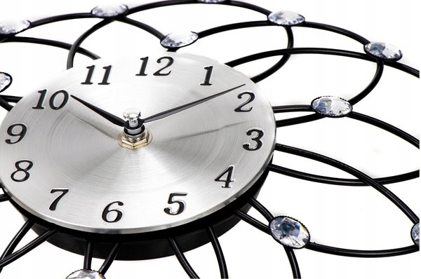 Merkloos Wandklok in bloemvorm - Zwart/Zilverkleur - 30 centimeter Merkloos Wandklok in bloemvorm - Zwart/Zilverkleur - 30 centimeter