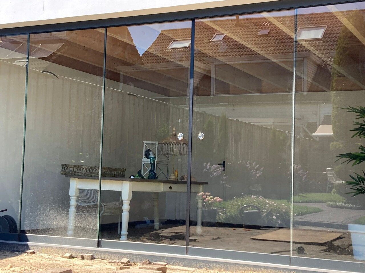 Glazen Schuifwand 2 spoor - 4 delig Glazen Schuifwand 2 spoor - 4 delig