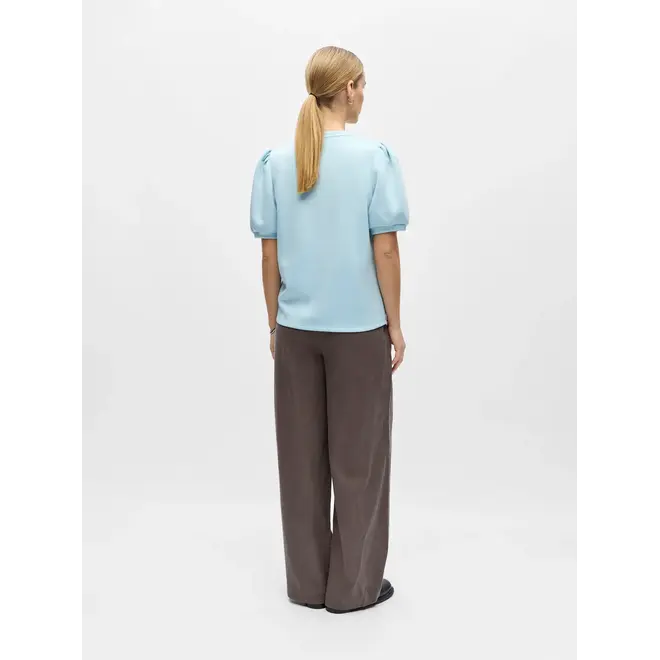 top met pofmouw lichtblauw