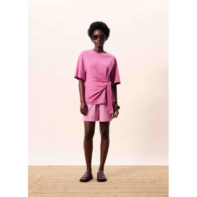 top met knoopdetals violine