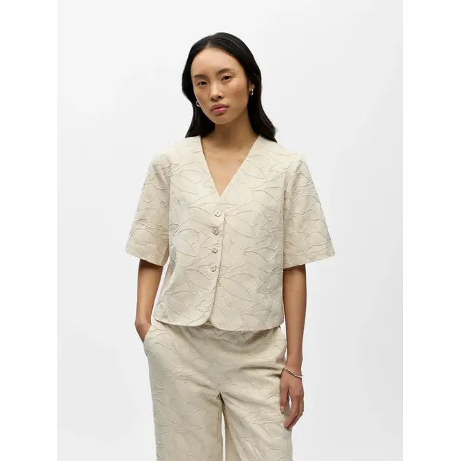 blouse met applicaties