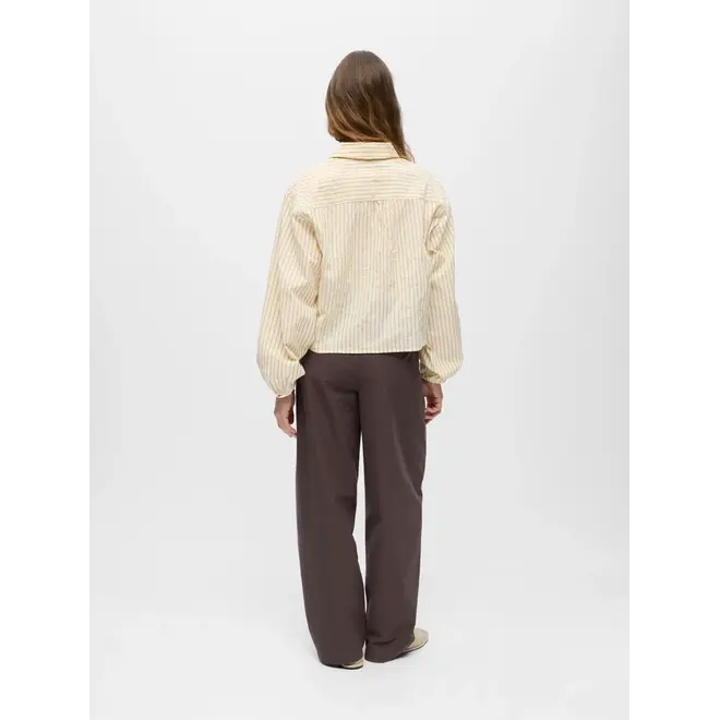 gestreepte blouse met applicaties