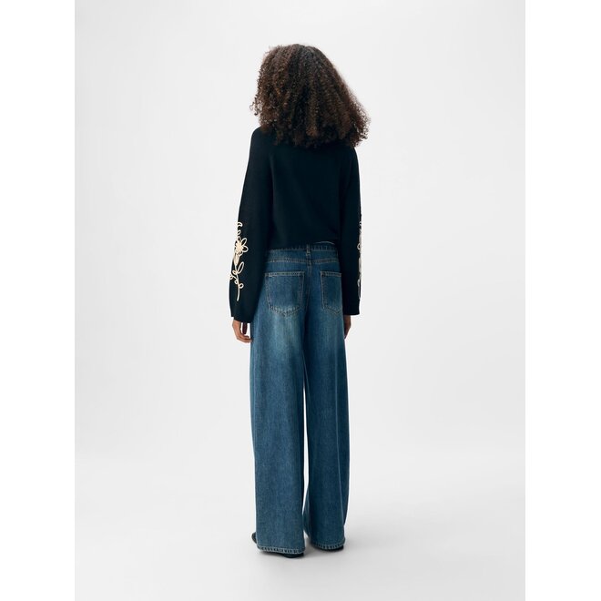 Jeans met strikceintuur