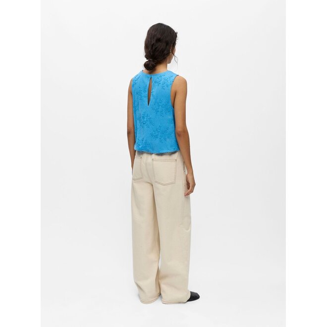 Geborduurde mouwloze top