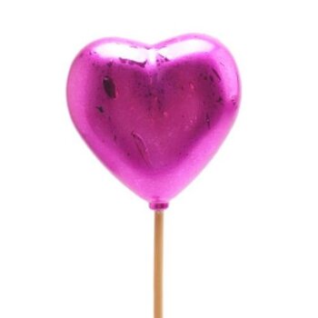 Pink heart on a stick