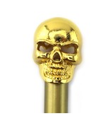 Gold-colored pencil, gold skull