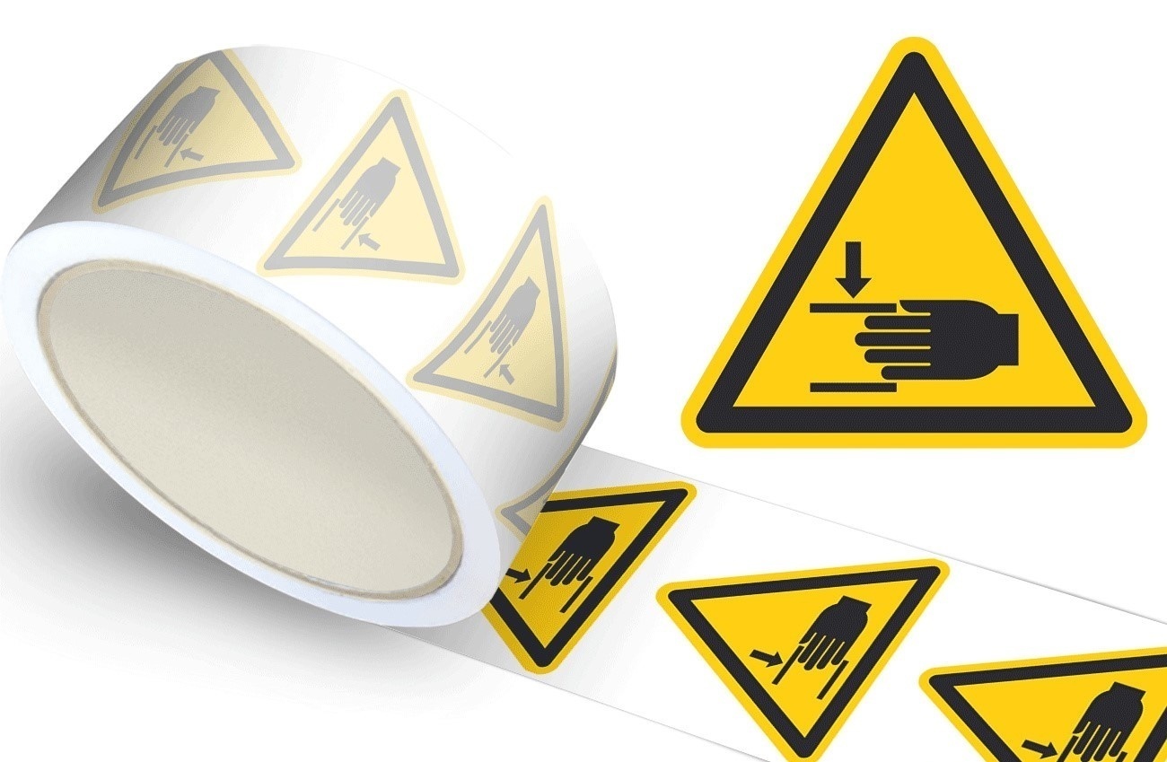 Waarschuwingssticker handbeklemming, op rol - 100 mm breed - 100 stickers