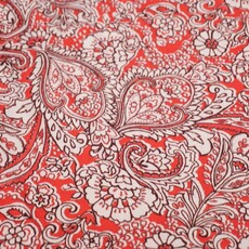  Polyester tricot koraalroze met wit paisley bloemen