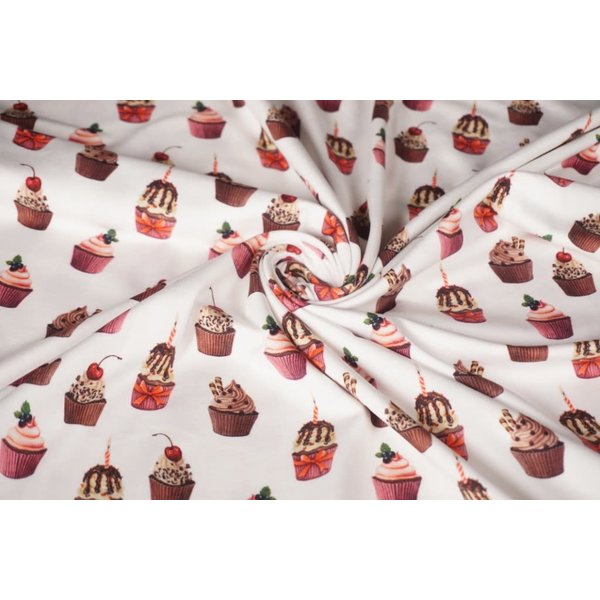 Tricot stof ecru met cupcakes