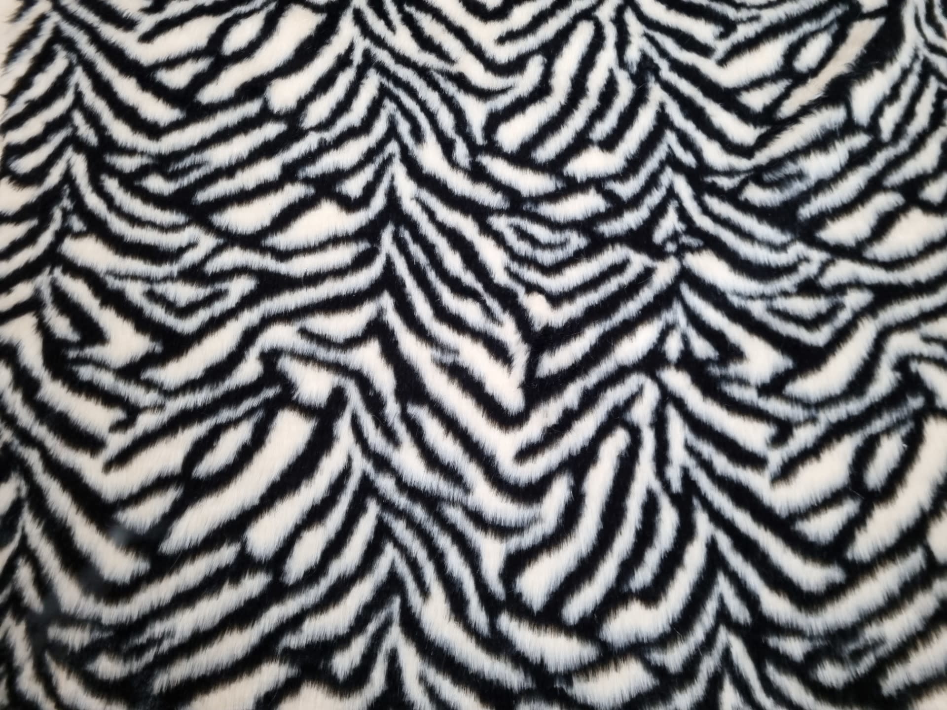Langharig Bont Zebraprint - Stoffenwebshop De Lappenkraam | De Lappenkraam