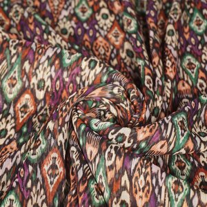  Chiffon met ikatprint en gouden lurex