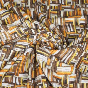  Viscose crepe met abstracte bruine streepjes