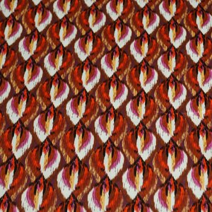 SALE Stretchkatoen met ronde ikatvormen goudbruin