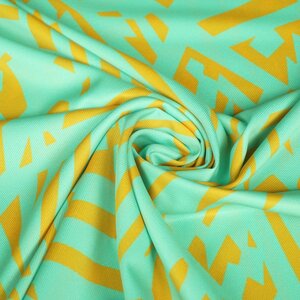 *** Polyester twill mintgroen met hoekige vormen