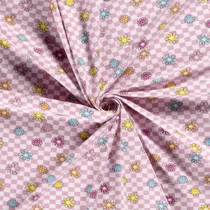  Tricot met roze vierkantjes en vrolijke bloemetjes