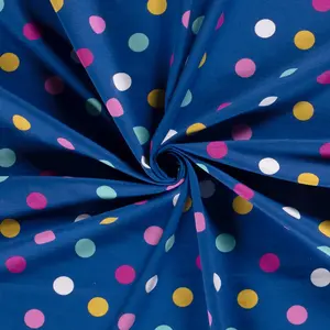  French terry blauw met gekleurde stippen