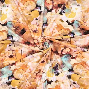 Viscose tricot crepe met aquarelbloem oranje