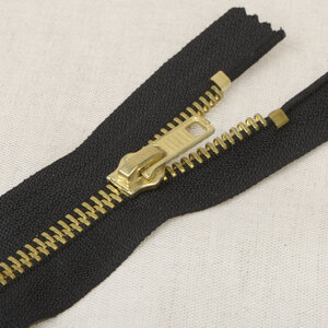  Jeansrits met gouden tandjes zwart