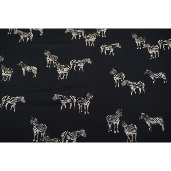 Zwarte viscose stof met dessin van zebrapaardjes