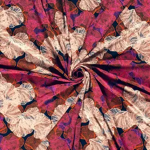 Viscose tricot donkerblauw met roze bloemen