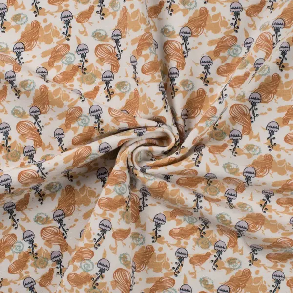 Organic tricot met kleine kwalletjes caramel